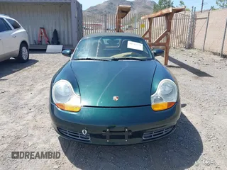 1999 Porsche Boxster with VIN WP0CA2986XU627495, listed as a IAAI auction lot 42112724 with 94,090 mi miles and . Bid and sale history available at DreamBid. Image 6.