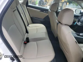 2017 Honda Civic EX-L z VIN 19XFC1F74HE014241, wystawiony jako Copart lot #59005745 z przebiegiem 55 629 mil mil oraz Czysty tytuł • Clean title. Historia ofert i sprzedaży dostępna na DreamBid. Obrazek 10.