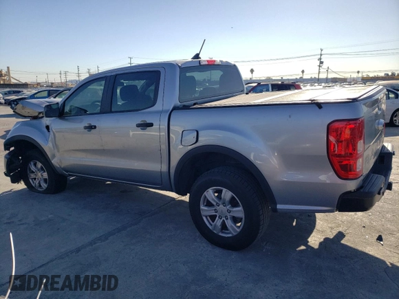 2023 Ford Ranger XL with VIN 1FTER4EH2PLE26234, listed as a Copart auction lot 86579934 with 59,389 mi miles and Salvage title. Bid and sale history available at DreamBid. Image 2.