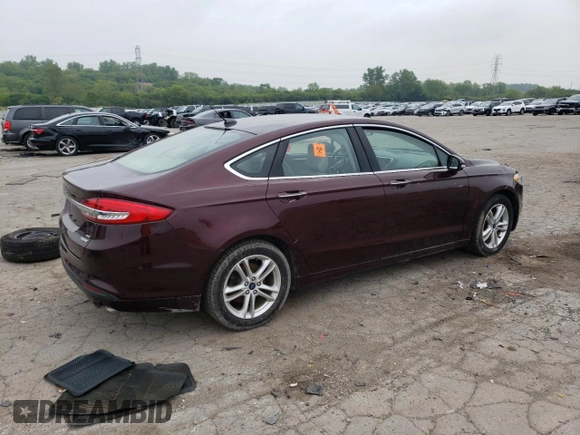 2018 Ford Fusion SE z VIN 3FA6P0HD2JR185298, wystawiony jako Copart lot #58898075 z przebiegiem Nie podano mil oraz Czysty tytuł • Clean title. Historia ofert i sprzedaży dostępna na DreamBid. Obrazek 3.