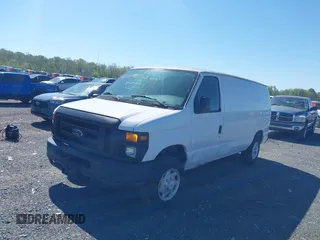 2008 Ford Econoline Cargo Commercial with VIN 1FTNE14W58DB12602, listed as a IAAI auction lot 42132156 with 201,448 mi miles. Bid and sale history available at carsss.com. Image 2.