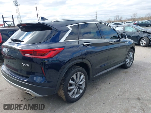 2021 Infiniti QX50 Luxe with VIN 3PCAJ5BB7MF123895, listed as a IAAI auction lot 41811100 with 23,164 mi miles and . Bid and sale history available at DreamBid. Image 4.