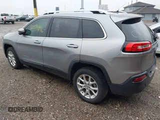 2014 Jeep Cherokee Latitude z VIN 1C4PJLCB3EW101628, wystawiony jako IAAI lot #42274896 z przebiegiem 174 624 mil mil oraz . Historia ofert i sprzedaży dostępna na DreamBid. Obrazek 3.