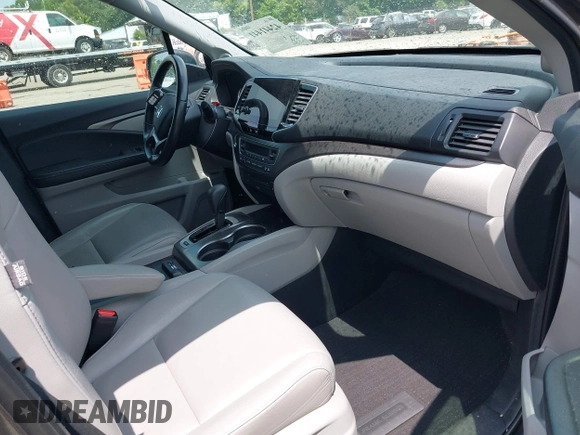2019 Honda Pilot EX-L with VIN 5FNYF5H4XKB018306, listed as a IAAI auction lot 42441441 with 53,212 mi miles and . Bid and sale history available at DreamBid. Image 5.