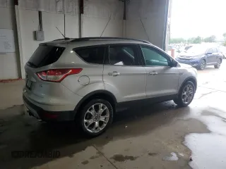 2014 Ford Escape SE z VIN 1FMCU9G97EUC43696, wystawiony jako Copart lot #57409665 z przebiegiem 68 586 mil mil oraz Czysty tytuł • Clean title. Historia ofert i sprzedaży dostępna na DreamBid. Obrazek 3.