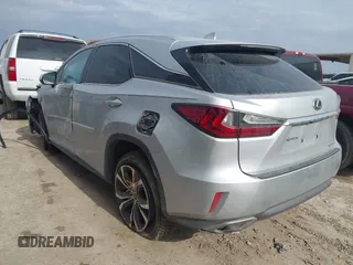 2019 Lexus RX with VIN 2T2ZZMCA3KC135292, listed as a IAAI auction lot 41573153 with 106,971 mi miles. Bid and sale history available at carsss.com. Image 3.