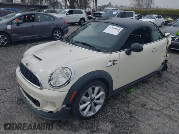 2013 MINI Coupe S with VIN WMWSX3C53DT466648, listed as a IAAI auction lot 41719597 with 106,936 mi miles and . Bid and sale history available at DreamBid. Image 18.