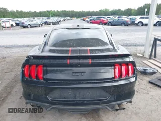 2018 Ford Mustang GT z VIN 1FA6P8CF0J5184418, wystawiony jako IAAI lot #42037264 z przebiegiem 99 679 mil mil oraz . Historia ofert i sprzedaży dostępna na DreamBid. Obrazek 17.