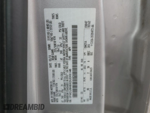 2013 Ford Escape SEL z VIN 1FMCU9H9XDUD00146, wystawiony jako Copart lot #60886165 z przebiegiem 198 557 mil mil oraz Szkoda całkowita • Salvage title. Historia ofert i sprzedaży dostępna na DreamBid. Obrazek 13.