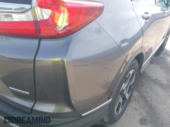 2018 Honda CR-V Touring with VIN 7FARW1H93JE027294, listed as a IAAI auction lot 41903484 with 80,999 mi miles and . Bid and sale history available at DreamBid. Image 20.