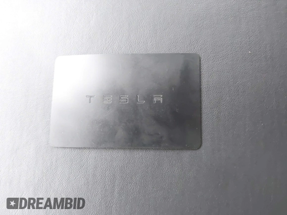 2019 Tesla Model 3 Mid Range with VIN 5YJ3E1EA5KF397098, listed as a IAAI auction lot 41943570 with 72,046 mi miles and . Bid and sale history available at DreamBid. Image 11.