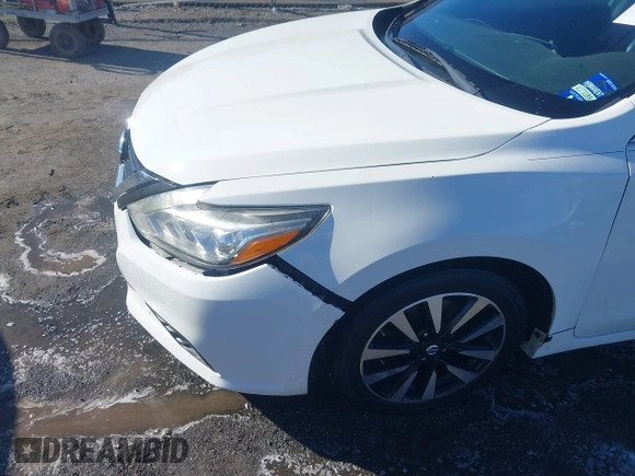 2018 Nissan Altima S with VIN 1N4AL3AP9JC181033, listed as a IAAI auction lot 41400570 with 198,928 mi miles and . Bid and sale history available at carsss.com. Image 18.