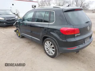 2016 Volkswagen Tiguan S with VIN WVGBV7AX9GW566451, listed as a IAAI auction lot 41393999 with 51,616 mi miles and . Bid and sale history available at DreamBid. Image 3.