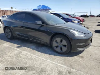 2022 Tesla Model 3 with VIN 5YJ3E1EAXNF120970, listed as a Copart auction lot 47631725 with 33,205 mi miles and Salvage Title. Bid and sale history available at DreamBid. Image 4.
