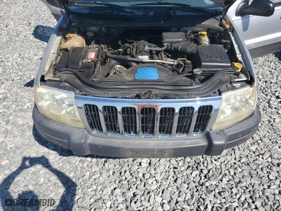 2003 Jeep Grand Cherokee Laredo with VIN 1J4GW48S23C513287, listed as a Copart auction lot 50515055 with 251,806 mi miles and Salvage Title. Bid and sale history available at carsss.com. Image 12.