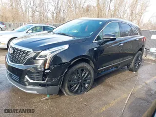 2021 Cadillac XT5 AWD Premium Luxury with VIN 1GYKNDRS0MZ135660, listed as a IAAI auction lot 41123089 with 26,361 mi miles. Bid and sale history available at carsss.com. Image 2.