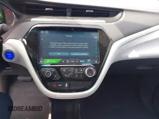 2020 Chevrolet Bolt EV LT z VIN 1G1FY6S06L4129658, wystawiony jako IAAI lot #42372460 z przebiegiem 43 417 mil mil oraz . Historia ofert i sprzedaży dostępna na DreamBid. Obrazek 18.