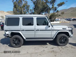 2004 Mercedes-Benz G-Class with VIN WDCYR49E84X142795, listed as a IAAI auction lot 41678941 with 257,855 mi miles. Bid and sale history available at carsss.com. Image 14.