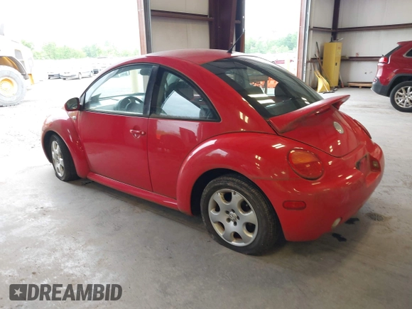 2003 Volkswagen Beetle GLS z VIN 3VWCK21C93M421676, wystawiony jako IAAI lot #42212863 z przebiegiem 115 134 mil mil oraz . Historia ofert i sprzedaży dostępna na DreamBid. Obrazek 3.
