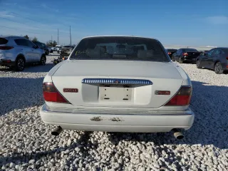1995 Jaguar XJ with VIN SAJKX1745SC739290, listed as a Copart auction lot 82887524 with Not provided miles and Salvage title. Bid and sale history available at DreamBid. Image 6.