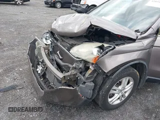 2011 Honda CR-V EX-L with VIN 5J6RE3H7XBL042313, listed as a IAAI auction lot 42034339 with 166,973 mi miles. Bid and sale history available at carsss.com. Image 6.