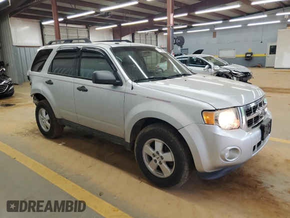2010 Ford Escape XLT с VIN 1FMCU9D76AKB94757, выставлен на аукционе Copart как лот 55735585 с пробегом 175 030 миль миль и Списание • Salvage title. История ставок и продаж доступна на DreamBid. Изображение 4.