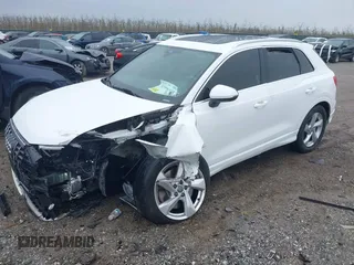 2020 Audi Q3 Premium with VIN WA1AECF35L1030273, listed as a IAAI auction lot 42006553 with 81,944 mi miles. Bid and sale history available at carsss.com. Image 17.