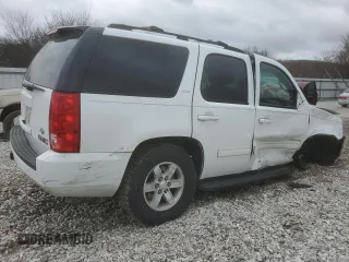 2012 GMC Yukon SLT with VIN 1GKS2CE09CR122728, listed as a Copart auction lot 87093604 with 124,739 mi miles and Salvage Title. Bid and sale history available at carsss.com. Image 3.