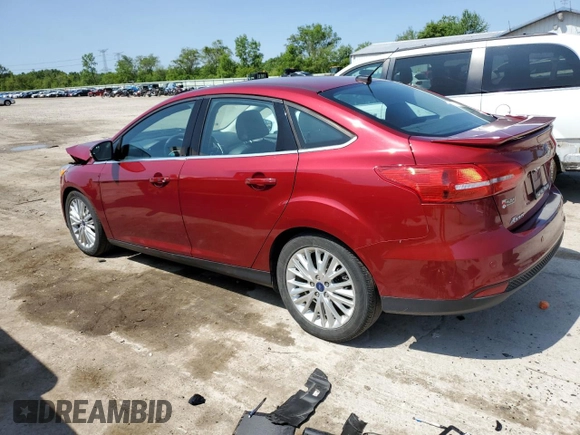 2017 Ford Focus Titanium with VIN 1FADP3J28HL209081, listed as a Copart auction lot 59171635 with 120,201 mi miles and Salvage title. Bid and sale history available at DreamBid. Image 2.