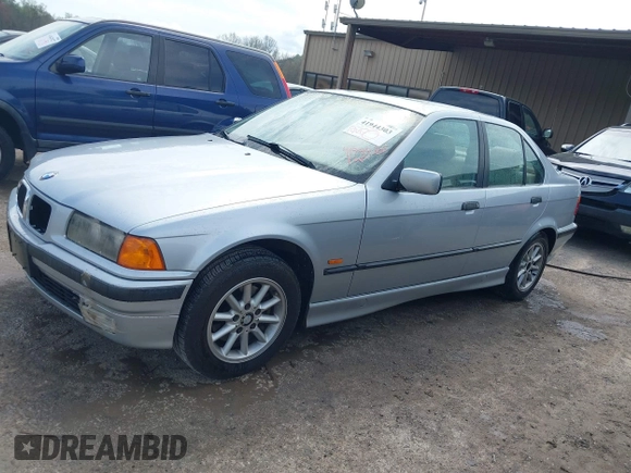 1998 BMW 3 Series 318i with VIN WBACC9322WEE60522, listed as a IAAI auction lot 41944303 with 226,799 mi miles. Bid and sale history available at carsss.com. Image 2.