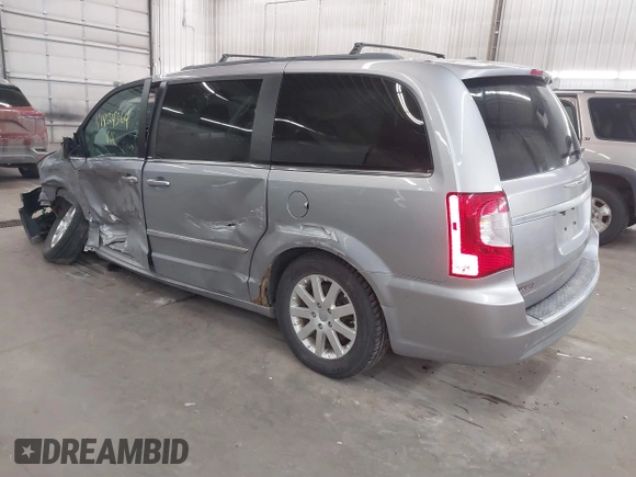 2013 Chrysler Town & Country Touring with VIN 2C4RC1BG9DR714736, listed as a IAAI auction lot 41824364 with 156,486 mi miles. Bid and sale history available at carsss.com. Image 3.