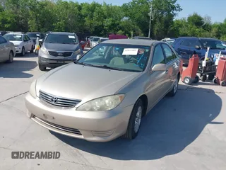 2006 Toyota Camry STD with VIN 4T1BE30K76U704819, listed as a IAAI auction lot 42021982 with 264,934 mi miles and . Bid and sale history available at carsss.com. Image 2.