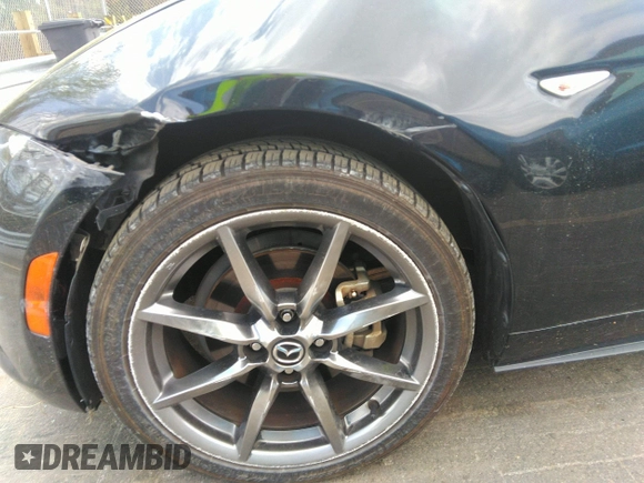 2021 Mazda MX-5 Miata Grand Touring z VIN JM1NDAM75M0451597, wystawiony jako IAAI lot #41932712 z przebiegiem 61 710 mil mil oraz . Historia ofert i sprzedaży dostępna na DreamBid. Obrazek 20.