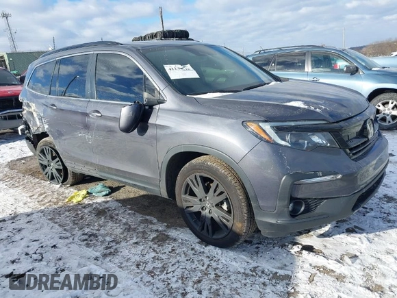 2022 Honda Pilot Special Edition with VIN 5FNYF6H20NB063506, listed as a IAAI auction lot 41239636 with 59,752 mi miles. Bid and sale history available at carsss.com. Image 1.