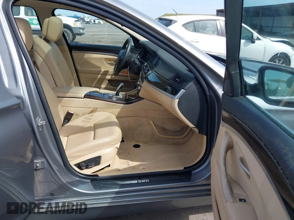 2012 BMW 5 Series 528i with VIN WBAXG5C53CDX04248, listed as a IAAI auction lot 42004099 with 197,776 mi miles. Bid and sale history available at carsss.com. Image 5.