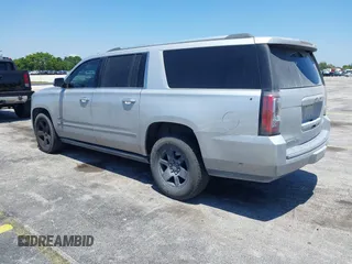 2016 GMC Yukon XL Denali with VIN 1GKS2HKJXGR423556, listed as a IAAI auction lot 42145970 with 118,436 mi miles. Bid and sale history available at carsss.com. Image 3.