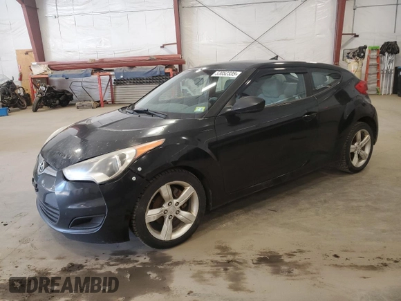2012 Hyundai Veloster w/Black Int z VIN KMHTC6AD6CU043856, wystawiony jako Copart lot #53052335 z przebiegiem 170 035 mil mil oraz Czysty tytuł • Clean title. Historia ofert i sprzedaży dostępna na DreamBid. Obrazek 1.