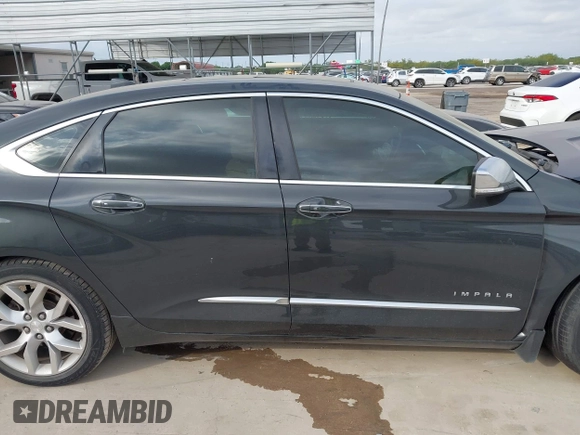 2014 Chevrolet Impala LTZ with VIN 2G1155S31E9101628, listed as a IAAI auction lot 42064481 with 148,511 mi miles and . Bid and sale history available at DreamBid. Image 12.