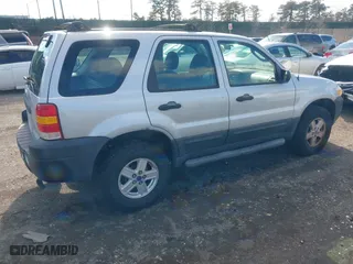 2006 Ford Escape XLS with VIN 1FMYU92Z36KA86730, listed as a IAAI auction lot 41520041 with 59,218 mi miles. Bid and sale history available at carsss.com. Image 4.