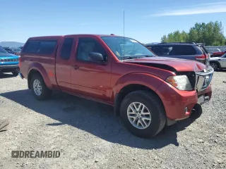 2016 Nissan Frontier SV with VIN 1N6AD0CWXGN719467, listed as a Copart auction lot 58824095 with 206,495 mi miles and Salvage title. Bid and sale history available at DreamBid. Image 4.