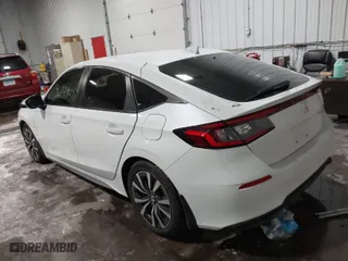 2022 Honda Civic Hatchback EX-L with VIN 19XFL1H73NE013106, listed as a IAAI auction lot 41559071 with 38,219 mi miles. Bid and sale history available at carsss.com. Image 3.