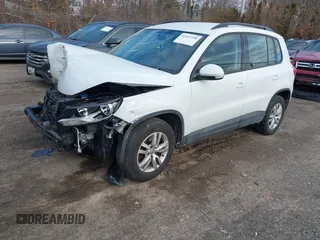 2015 Volkswagen Tiguan SE z VIN WVGBV7AX8FW582171, wystawiony jako IAAI lot #41442290 z przebiegiem 127 642 mil mil oraz . Historia ofert i sprzedaży dostępna na DreamBid. Obrazek 2.