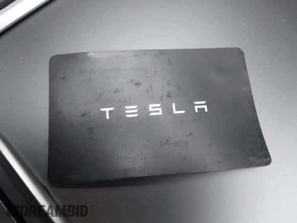 2021 Tesla Model 3 Performance with VIN 5YJ3E1EC6MF996743, listed as a IAAI auction lot 41509631 with 41,599 mi miles and . Bid and sale history available at DreamBid. Image 11.