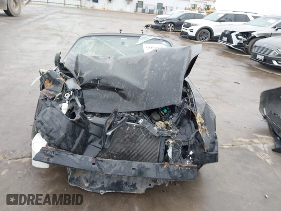 2002 Toyota MR2 z VIN JTDFR320720045244, wystawiony jako IAAI lot #40486938 z przebiegiem 61 802 mil mil oraz . Historia ofert i sprzedaży dostępna na DreamBid. Obrazek 13.