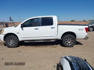2004 Nissan Titan LE z VIN 1N6AA07B14N528418, wystawiony jako IAAI lot #42281318 z przebiegiem 200 902 mil mil oraz . Historia ofert i sprzedaży dostępna na DreamBid. Obrazek 14.