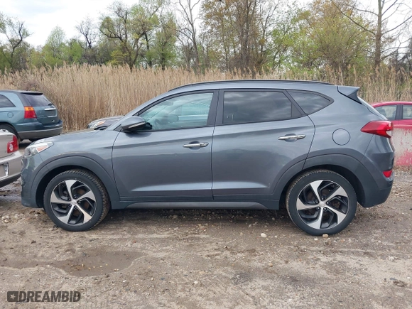2016 Hyundai Tucson Limited with VIN KM8J3CA27GU088248, listed as a IAAI auction lot 42033882 with 102,112 mi miles. Bid and sale history available at carsss.com. Image 14.