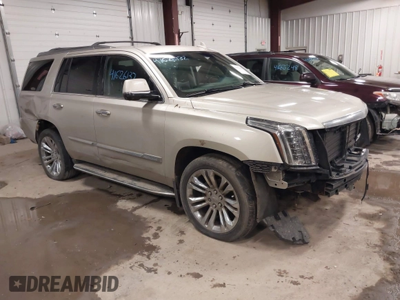 2017 Cadillac Escalade Premium Luxury z VIN 1GYS4CKJ9HR390988, wystawiony jako IAAI lot #41626132 z przebiegiem 166 185 mil mil oraz . Historia ofert i sprzedaży dostępna na DreamBid. Obrazek 1.