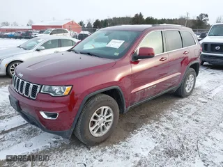 2018 Jeep Grand Cherokee Laredo E with VIN 1C4RJFAG9JC504596, listed as a IAAI auction lot 41595149 with 93,713 mi miles. Bid and sale history available at carsss.com. Image 2.