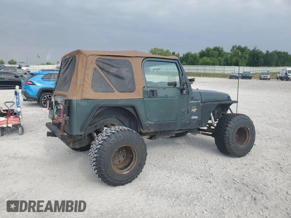 2002 Jeep Wrangler Sahara with VIN 1J4FA59S02P729015, listed as a Copart auction lot 63525745 with Not provided miles and Clean title. Bid and sale history available at DreamBid. Image 3.