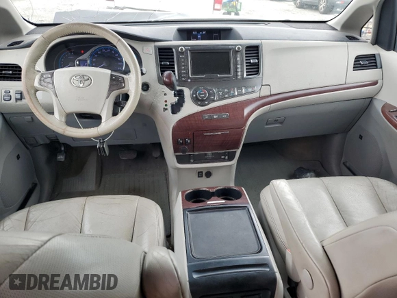 2012 Toyota Sienna XLE AAS with VIN 5TDYK3DC0CS251735, listed as a Copart auction lot 62208805 with 217,504 mi miles and Clean title. Bid and sale history available at DreamBid. Image 8.